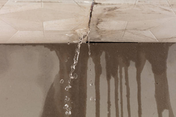 Professional Flood Damage Cleanup technician working in Burnham, PA